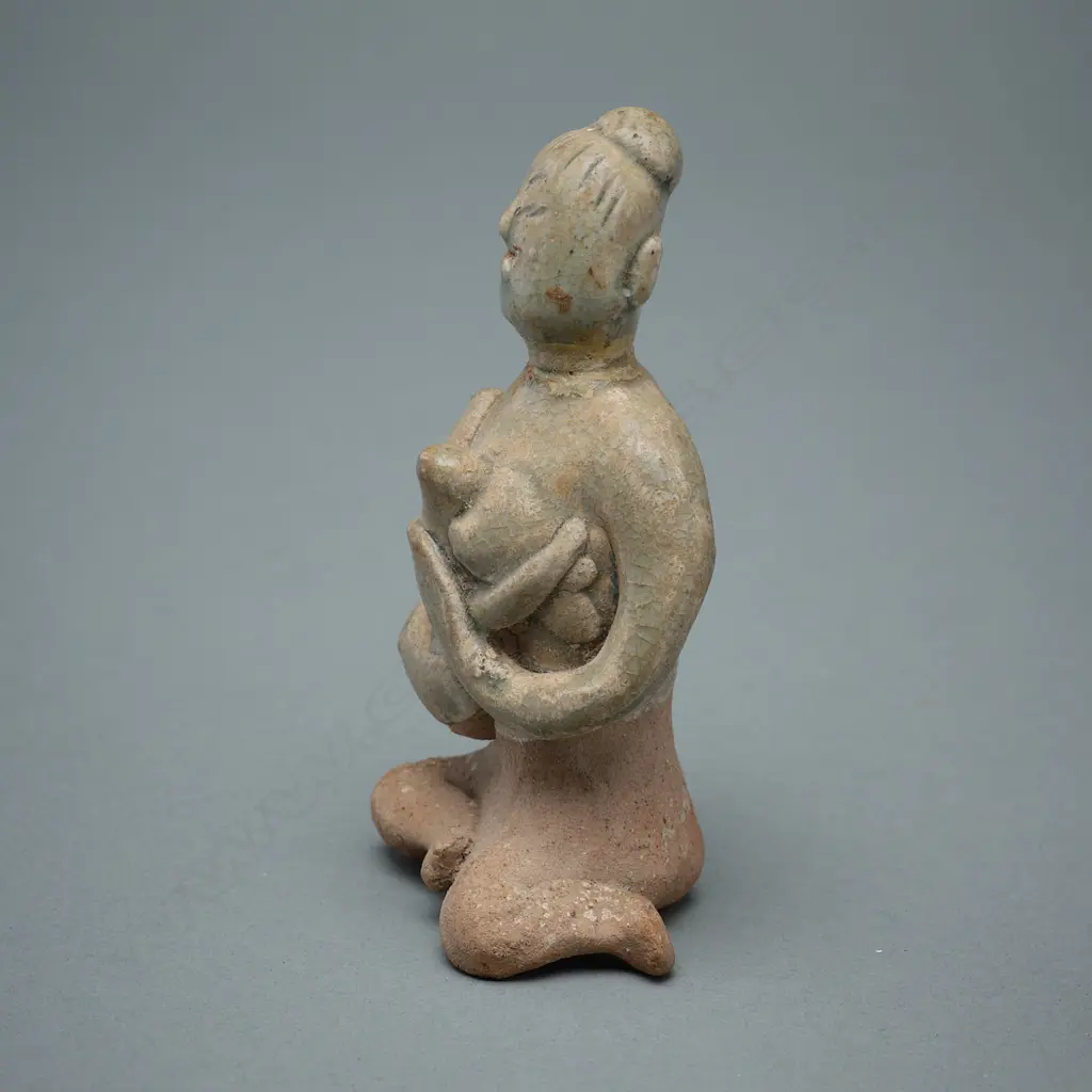 A Sawankhalok stoneware figure (tukatha), Image 1++